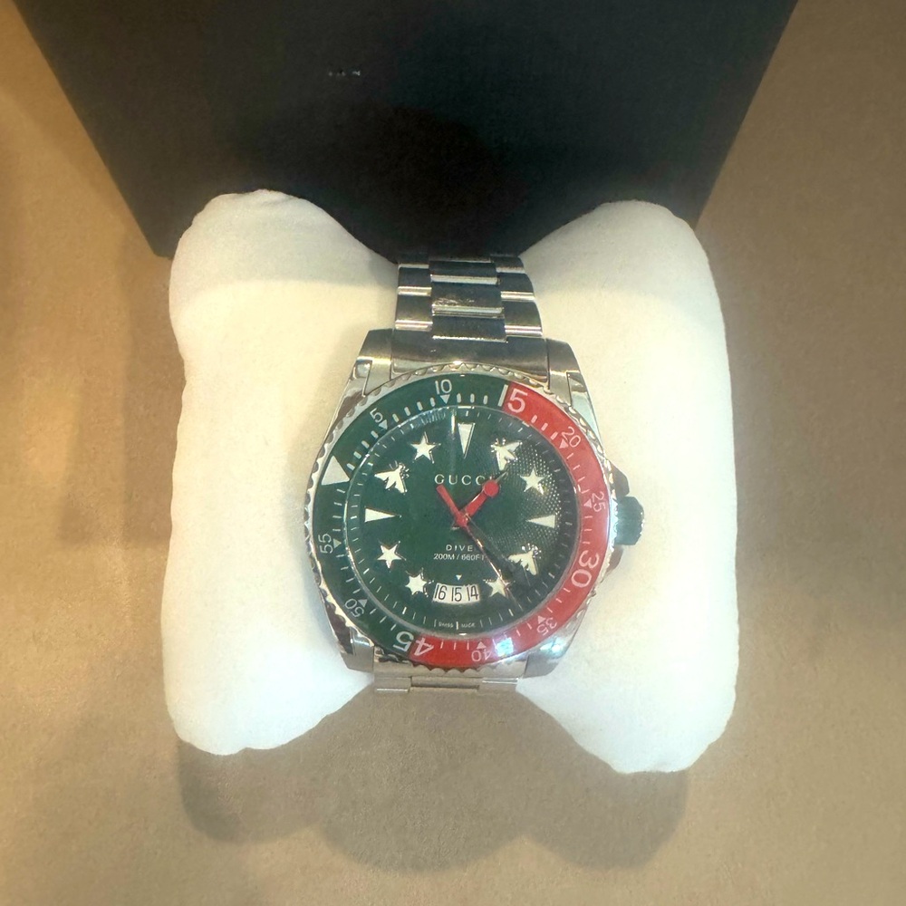 Gucci Men's Silver and Black Watch